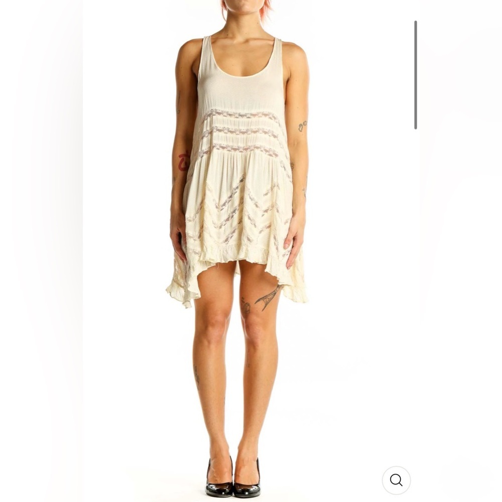 INTIMATELY FREE PEOPLE
Ivory Lace-Trimmed Flowy Mini Dress
